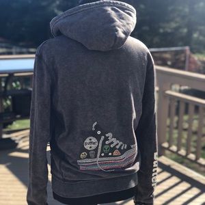 Butter zip up with sneaker on back